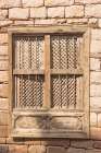 Saudi Arabia, Medina. Barred and shuttered wooden window in old town Al-Ula. Art Print